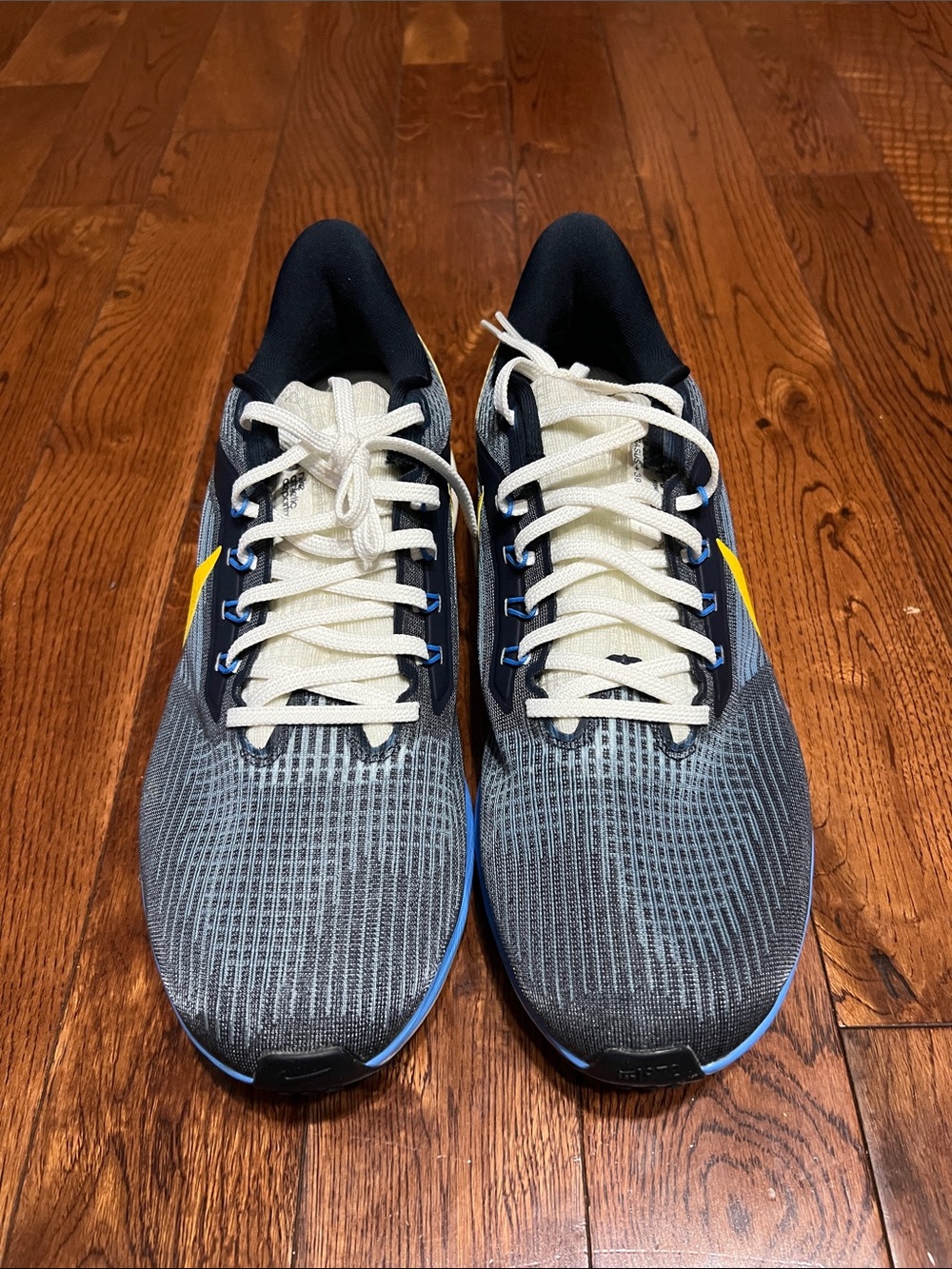 Nike Air Zoom Pegasus Gray Running Shoes with Blue and Yellow Accents